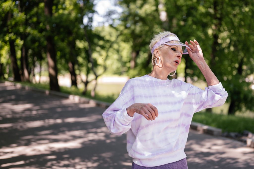 Woman walking wearing sports active wear clothes