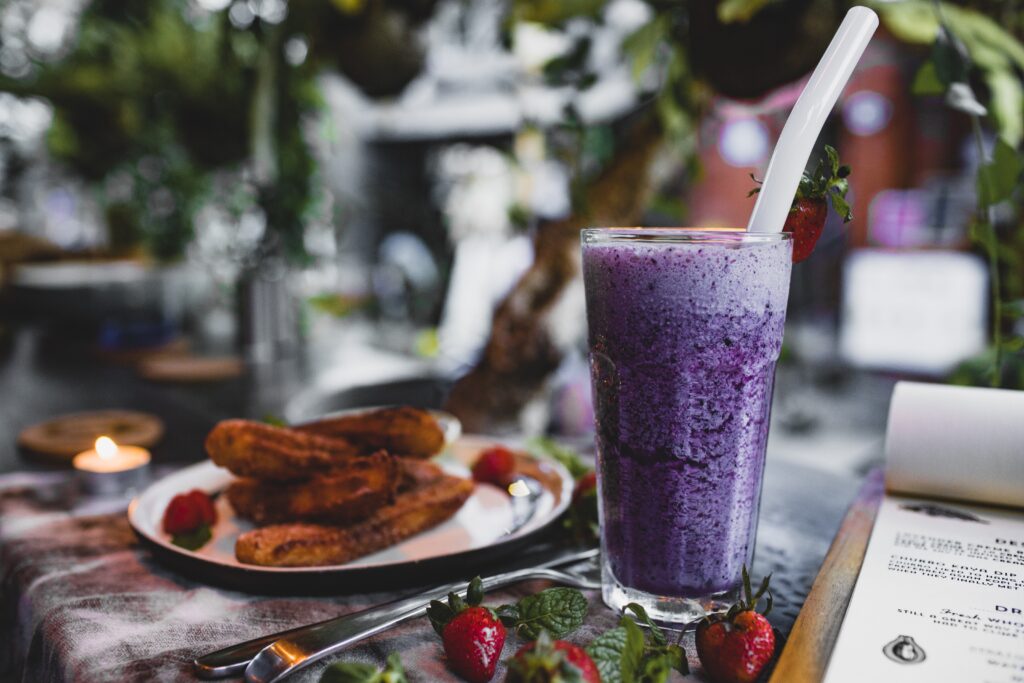 A purple smoothie on a table